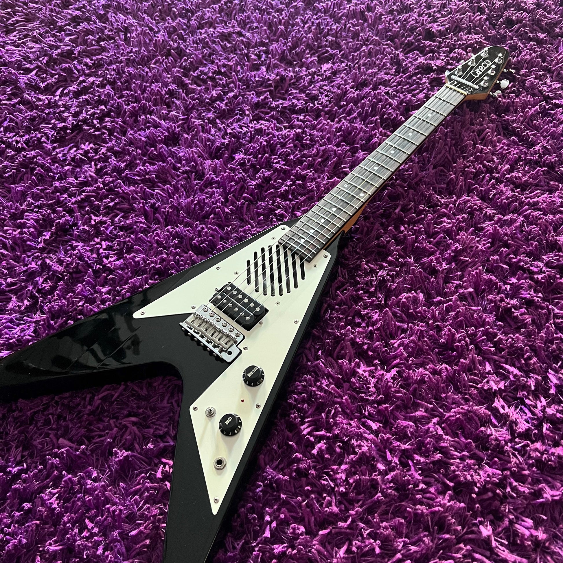 Early 90s Greco MINI-FV Flying V w/ Onboard Speaker & Gig Bag Early 90s Greco MINI-FV Flying V w/ Onboard Speaker & Gig Bag